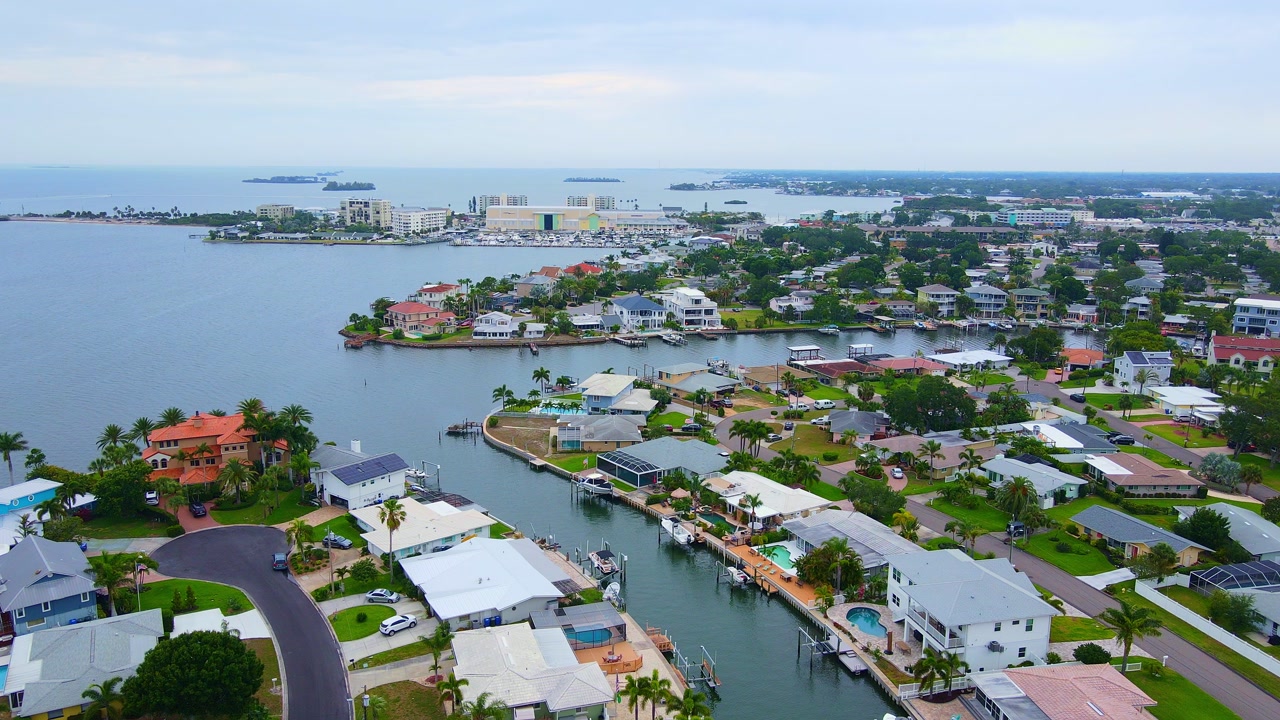 Dunedin Florida waterfront homes and canals connecting to the Gulf of Mexico with view of Dunedin Causeway
