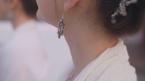 earring of girl walking , slow motion