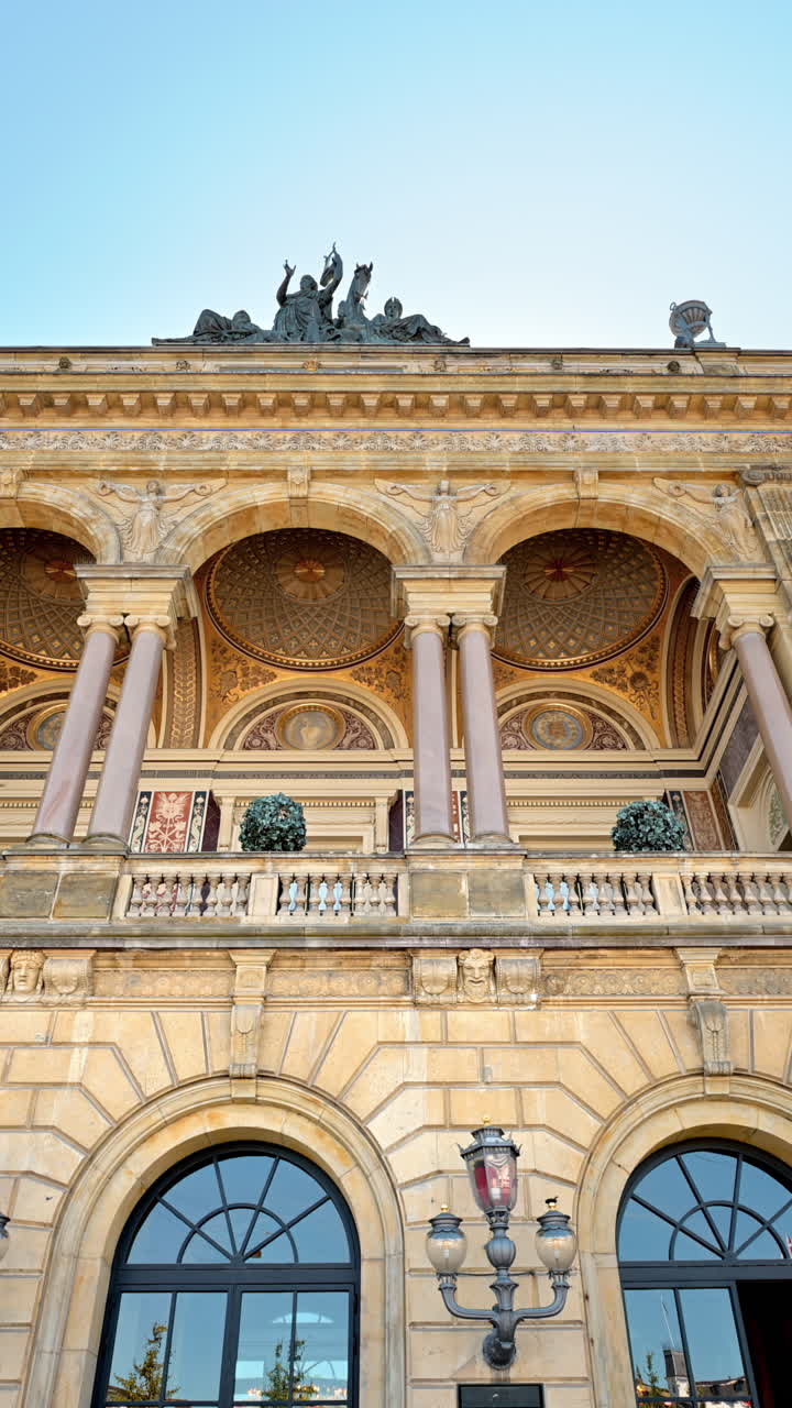 The facade of the Royal Playhouse and The Old Stage in Copenhagen, Denmark. Vertical