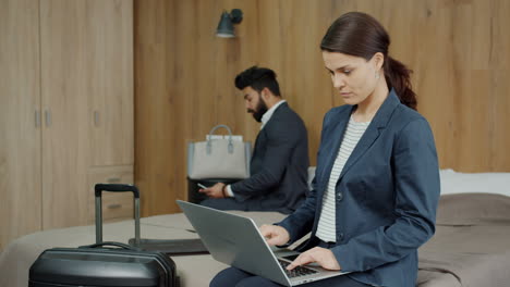 Business People Working in Hotel Room