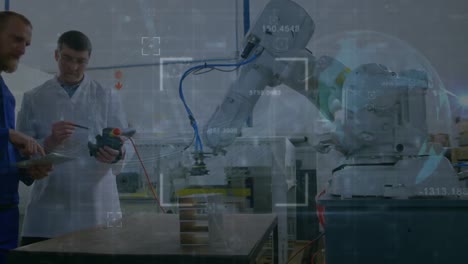 animation of globe and numbers over caucasian engineers examining robotic equipment