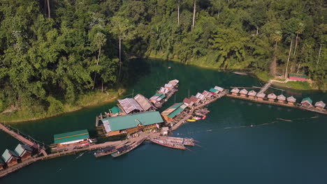 Drone-shot-of-floating-raft-houses-in-Khlong-Phanom-national-park-in-Thailand