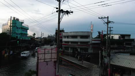 drone take off shot, viewing flooded places and highways from dagupan city, philippines