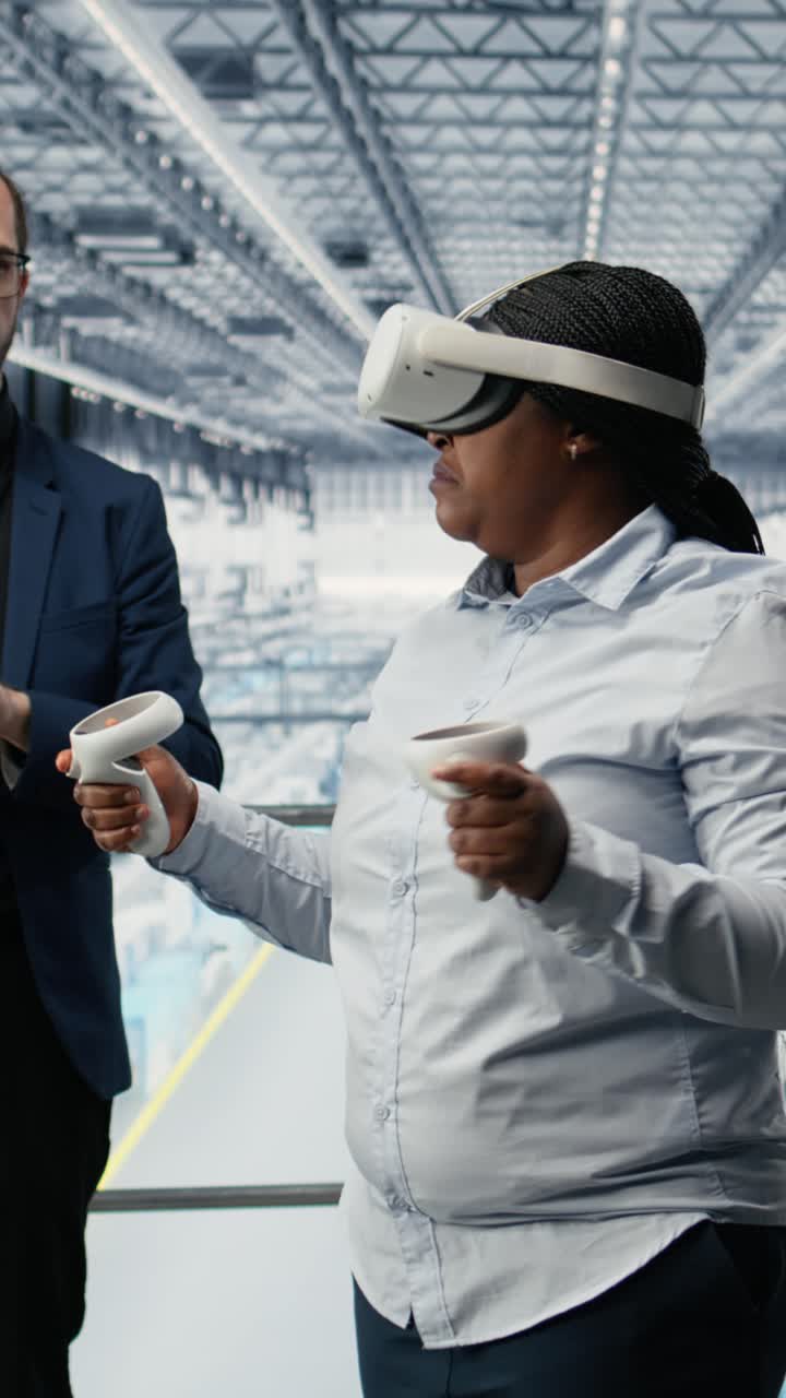 Vertical video Managers in microchip smart factory using VR glasses gear to develop electronics