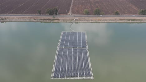 floating solar panels on top of a water reservoir