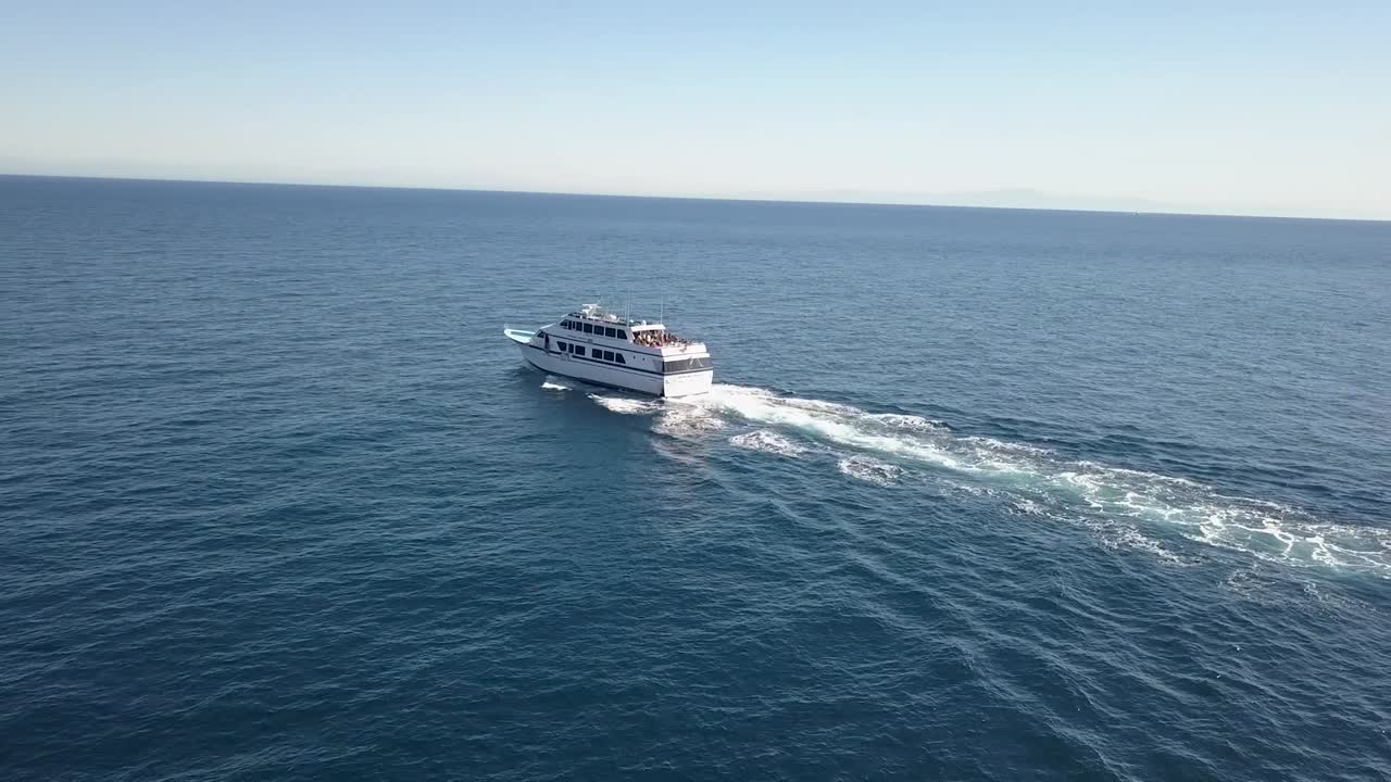 Boat departs from Catalina island California Aerial