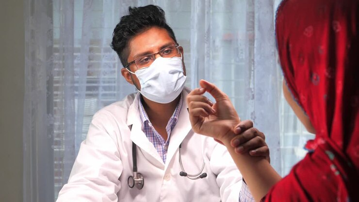 dokter memeriksa pasien