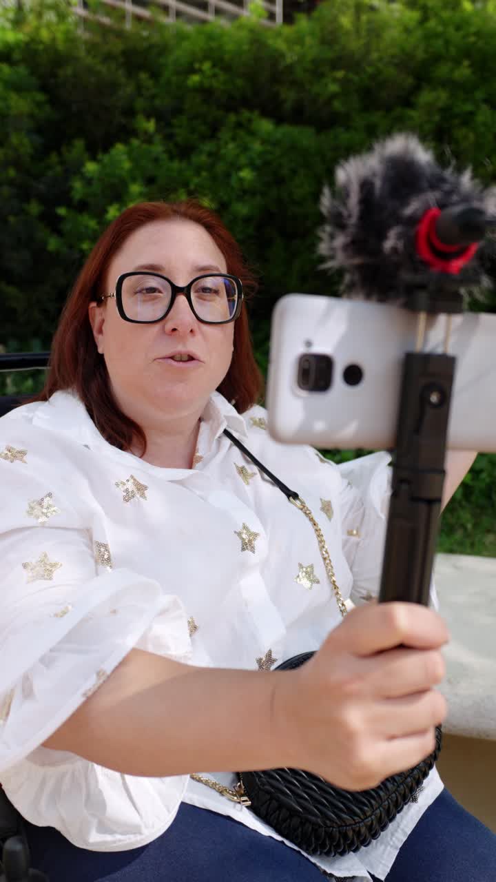 Woman vlogging with mobile phone