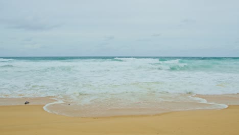 sea waves seamless loop on the white phuket sand beach