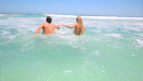 couple swimming together