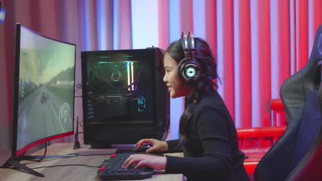 girl gamer at her pc