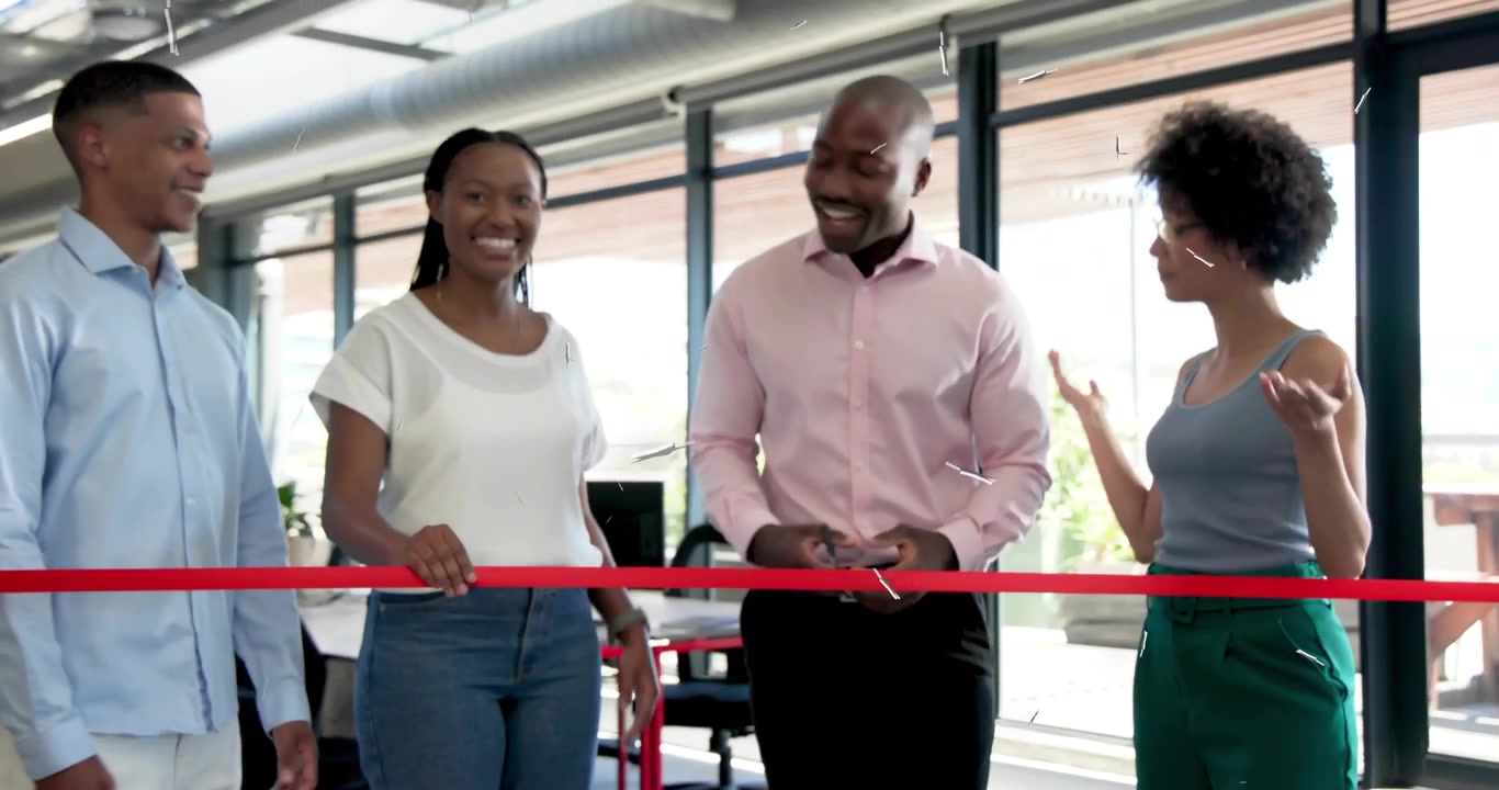 Team producing scissors for red ribbon cutting, celebrating office opening with animated fragments