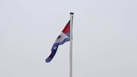 Bandera-De-La-Isla-De-Langeoog-En-El-Viento