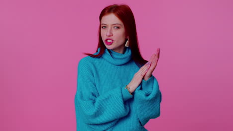 Teen-redhead-girl-in-blue-sweater-showing-thumbs-up-and-nodding-in-approval,-successful-good-work