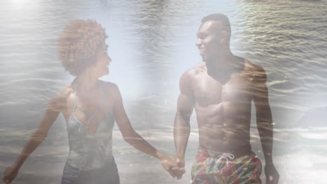animación de una feliz pareja afroamericana en la playa sobre el mar