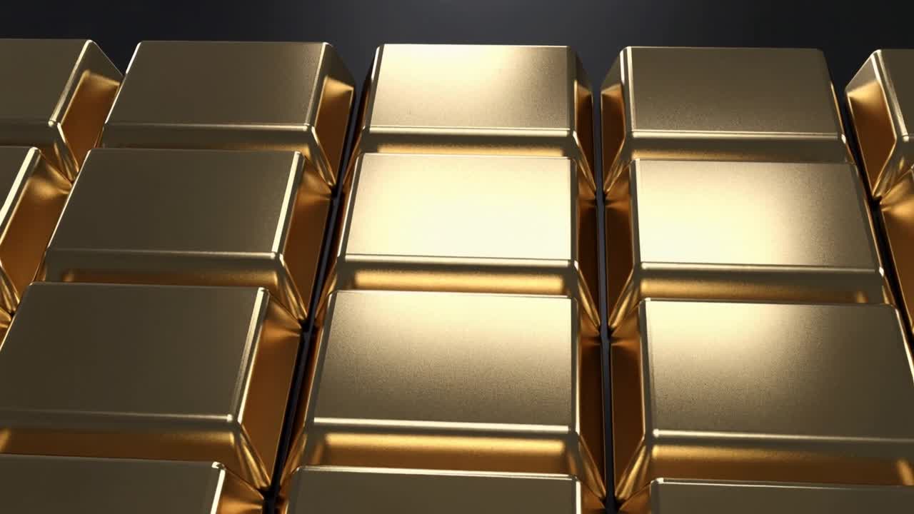 Telecamera in movimento che cattura una griglia di blocchi metallici dorati in studio, rivelando bordi smussati e riflessi.