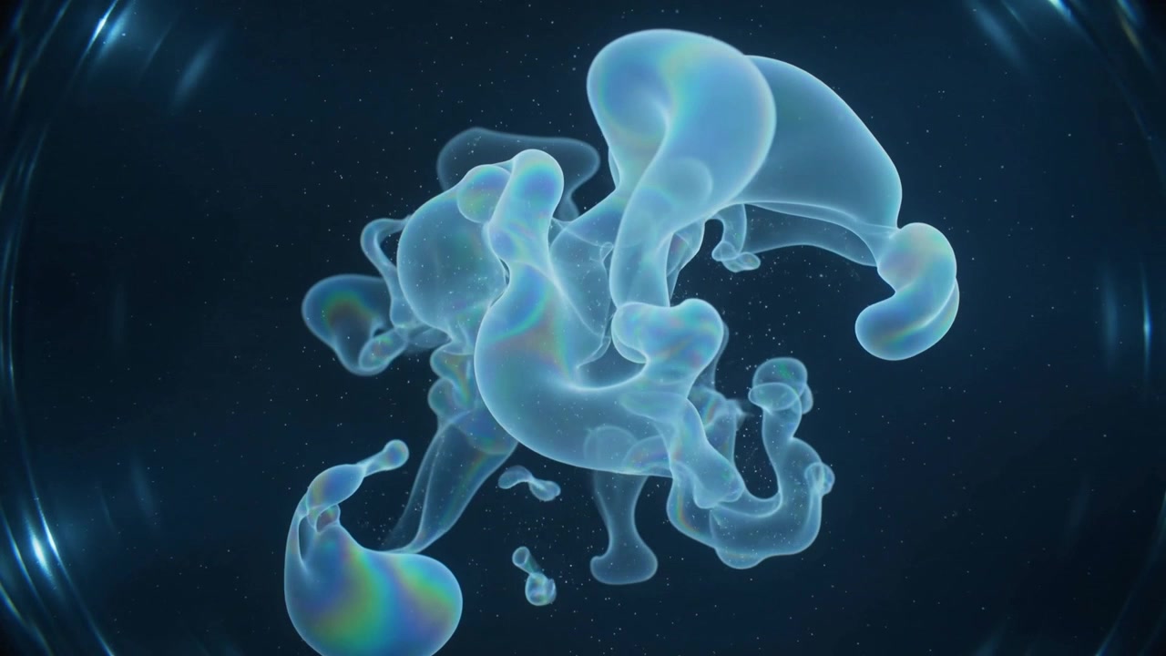 Expanding sheer mass reacting to light in blue field with rim, losing drops and growing tendrils