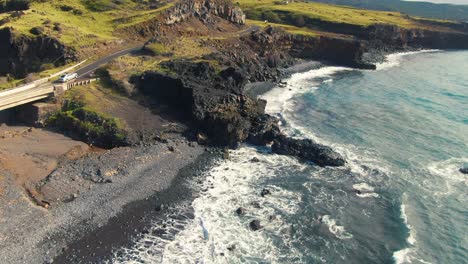 road to hana and sea cave nearby, hawaii island, aerial drone view