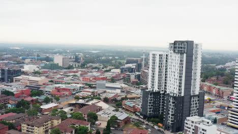 Aerial-drone-shot-flying-around-apartments-and-high-rise-buildings-in-Liverpool-Sydney-Australia