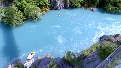 man bungee jumping off kawarau bridge in new zealand
