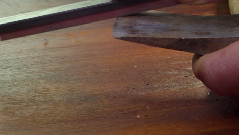 burrs removed from well-used old axe head using sharpening stone