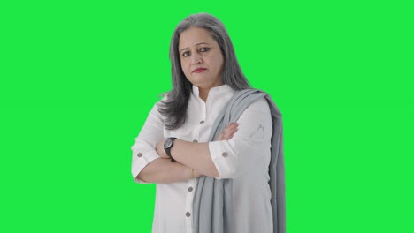 Portrait-of-Confident-Indian-senior-manager-standing-crossed-hands-Green-screen