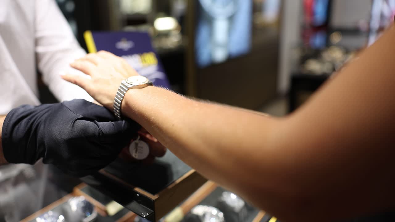 Customer Trying On a Luxury Watch in a Jewelry Store