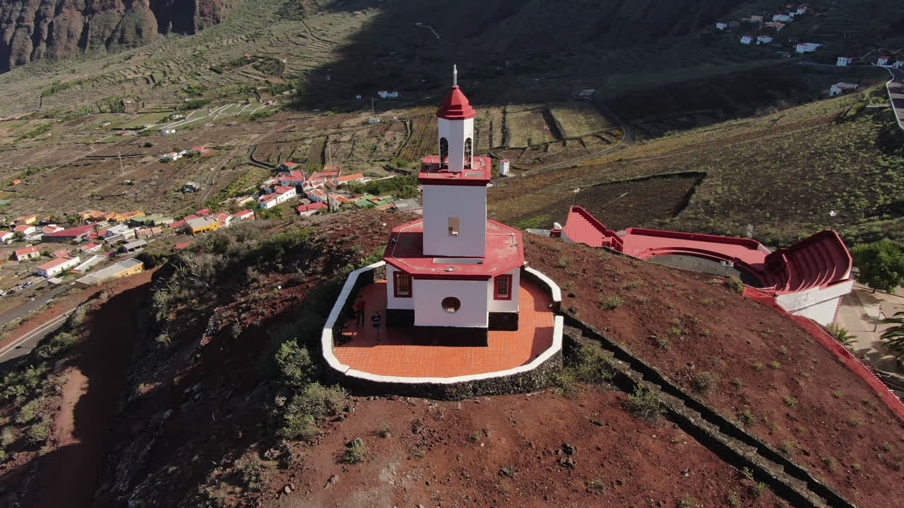 Drone footage orbiting the parish church of Our Lady of Candelaria on a hilltop in El Hierro