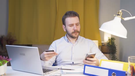 home office worker man doing online shopping.
