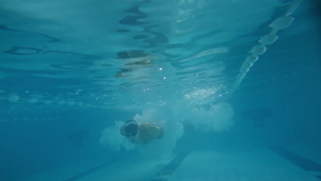 underwater swimming in a pool