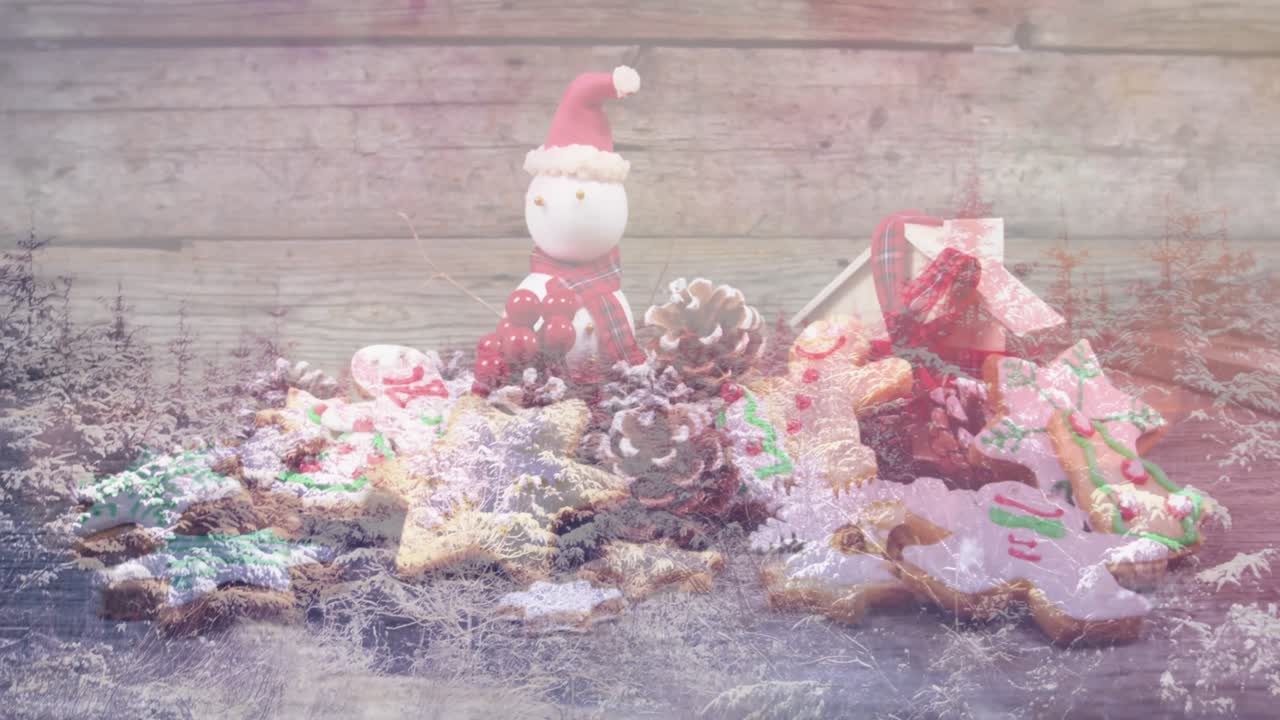 Animation of winter landscape over christmas decorations