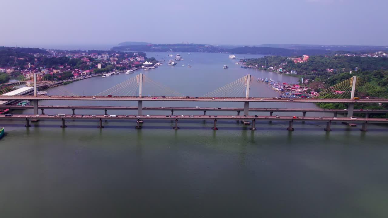 Aerial view of atal setu bridge with Mandovi River and Panaji city at goa, india. day time, push in shot, drone shot, 4k