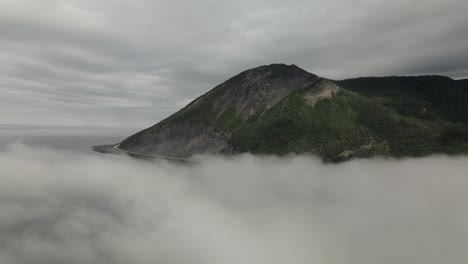 Flying-Over-The-White-Clouds-With-A-View-Of-Chic-Choc-Mountain-Range-In-Quebec,-Canada