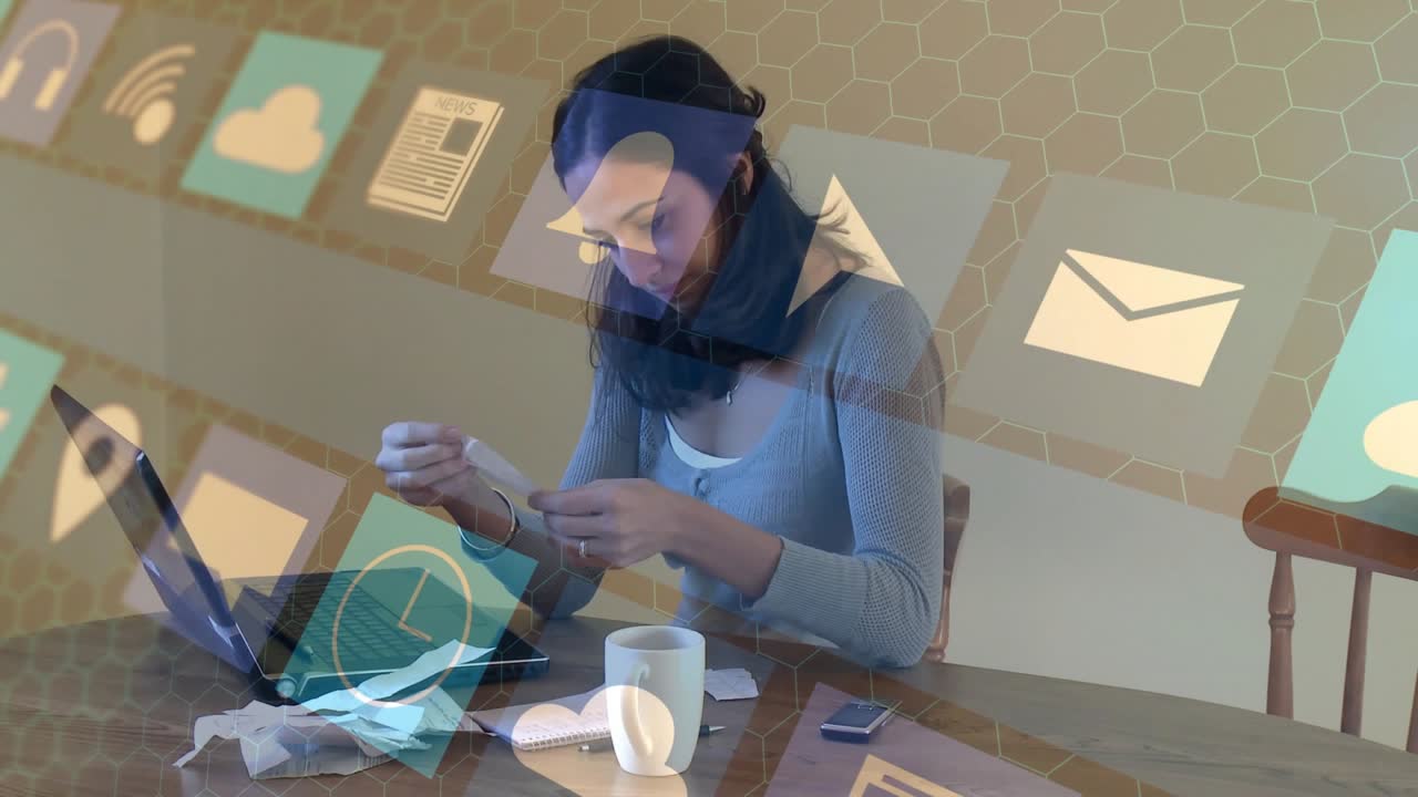 Woman receiving alerts and reconciling receipts on laptop for finance review while icons overlaying