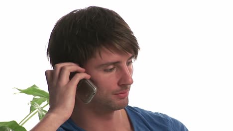 attractive man talking on mobile phone