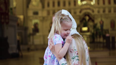 mother and daugher in the church