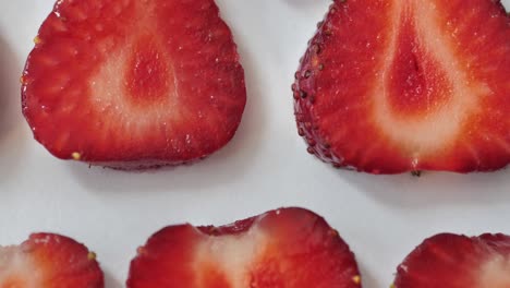 strawberry background motion design video. bio slice fruit berries. color texture close up. 4k 3840x2160