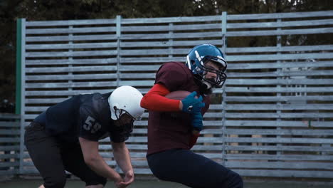 american football players practicing on a field