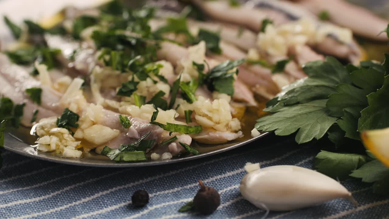 Fresh Sea sardines and Anchovy Fish and Mullus On Display On Ice On Market Store Shop. Seafood Fish Background, close up stand of small salty white fish.