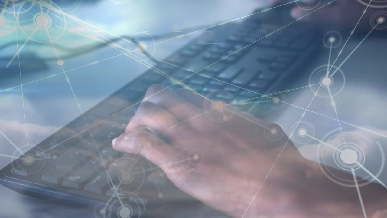 Person Typing on Computer Keyboard with Digital Network Overlay