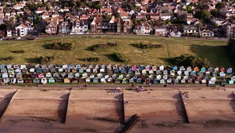 aerial view of whitstable beach with huts and town, sunny calm mood