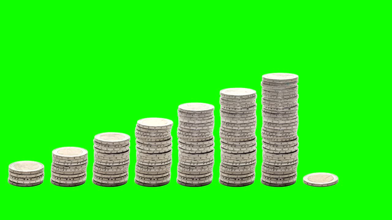 Nine stacks of coins increasing. Stop Motion. Chroma Key.