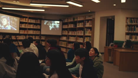 student movie viewing in library