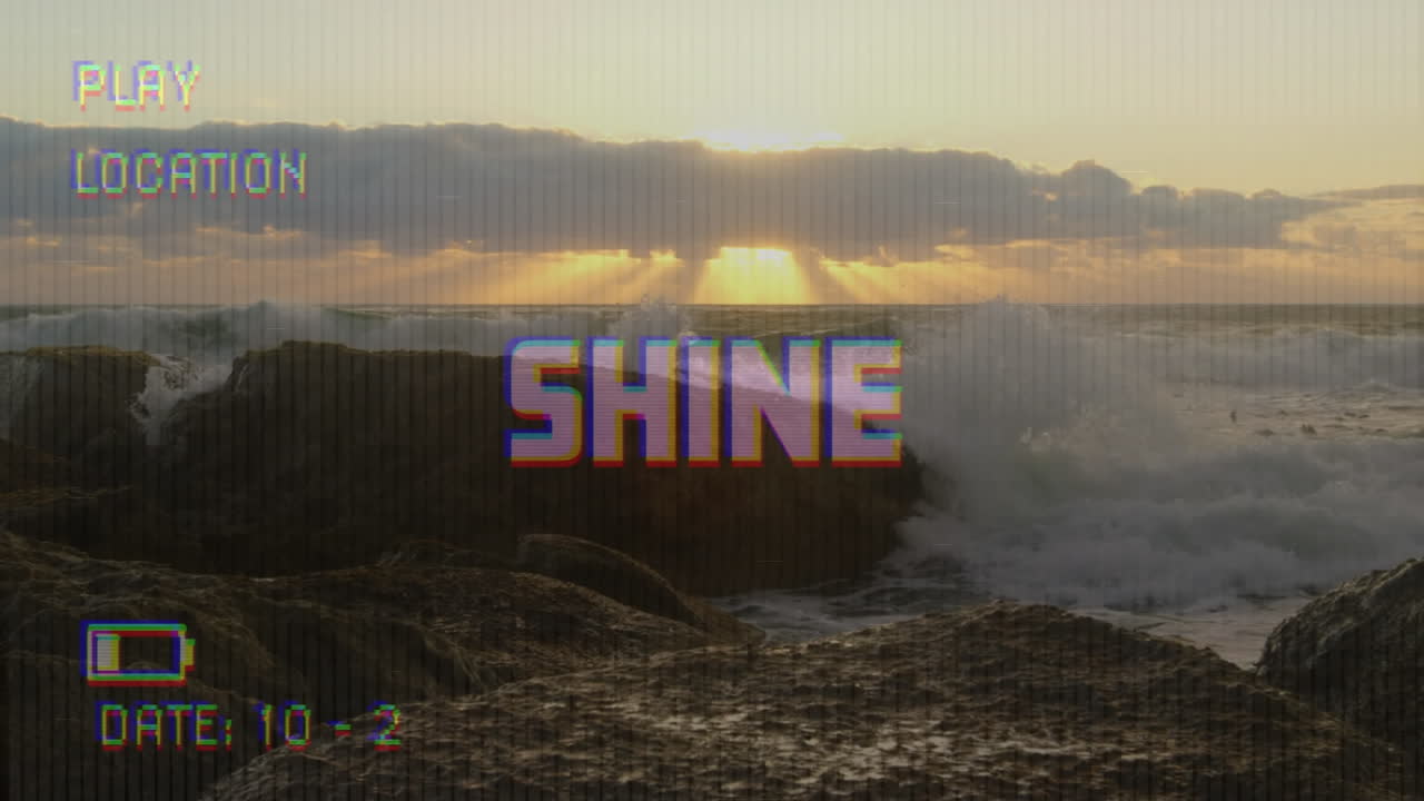 Animation of shine text on video camera screen with digital interface filming landscape
