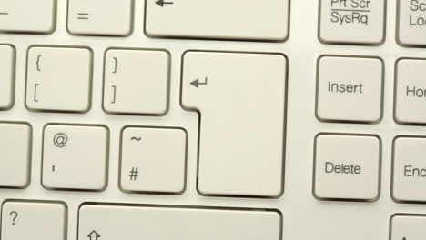 hand pressing enter key