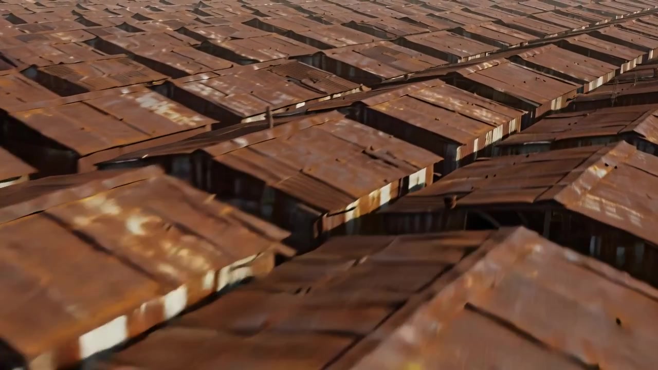 Beginning glide camera moving forward over industrial yard, revealing rusted panels and narrow gaps