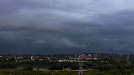 dark and scary time lapse of cloud formation passing above the city