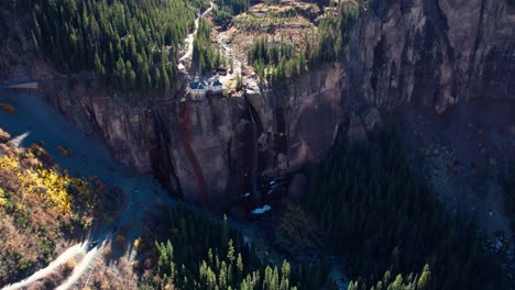 Fast-moving-drone-shot-revealing-the-water-fall-at-Bridal-Veil-Falls,-Telluride