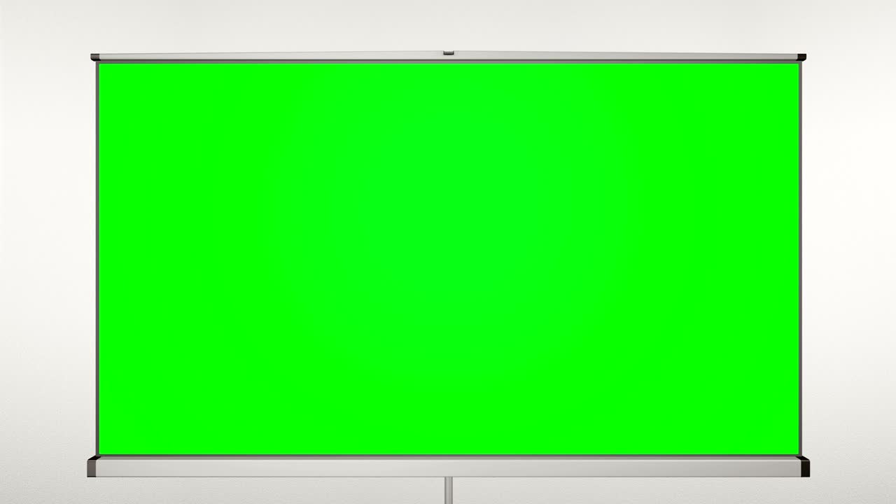 Projection cinema screen pull-down and camera zoom to green screen. White wall behind tripod.