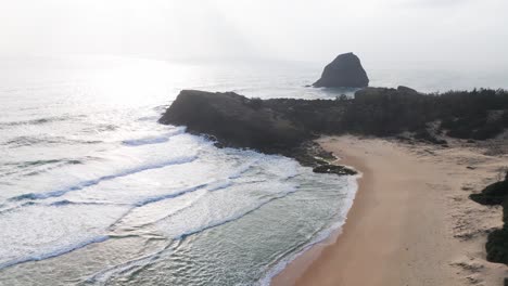 aerial view boom of bãi tắm hòn choi beach and the mountain.